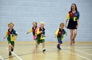 Scrumys Franchise  group of young children running having fun