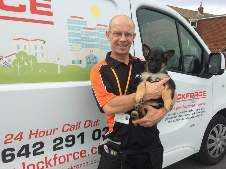 Lockforce franchise Alastair, a successful franchisee with his puppy