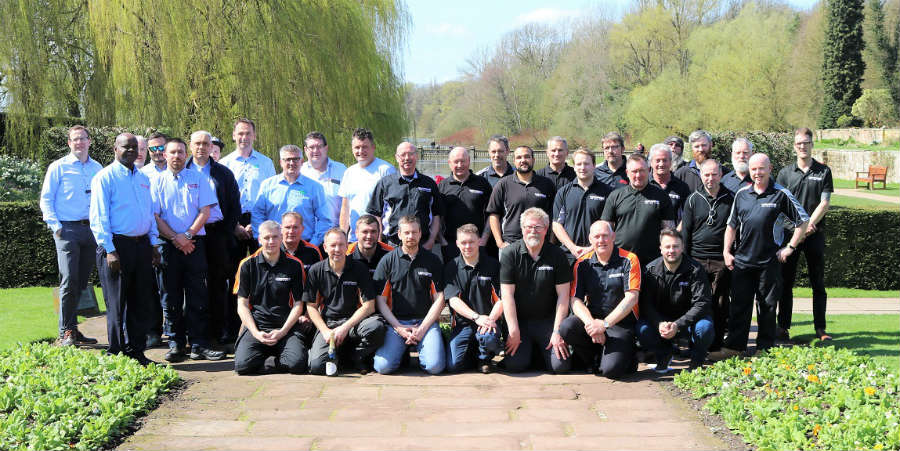 Lockforce franchise group picture in the sun of workers and franchisees